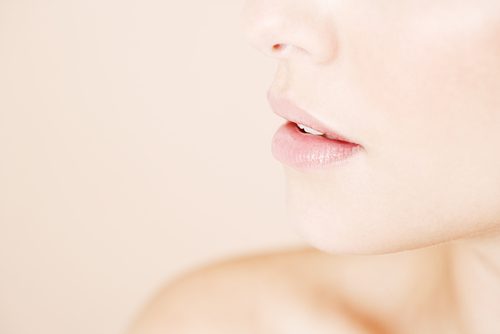Detail of young womans face showing mouth and chin-img-blog
