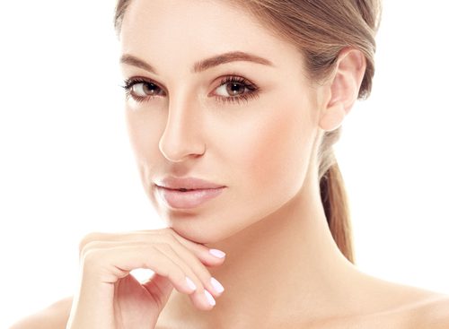 beautiful woman with hand to chin-img-blog
