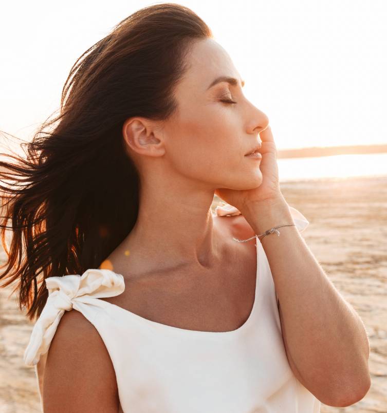 Woman enjoying the sun on her skin