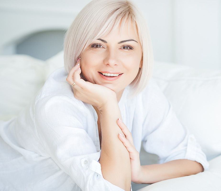 Mid age female in white tshirt