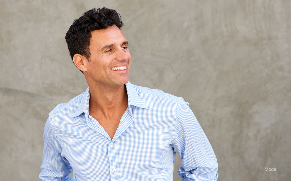 well dressed man smiling