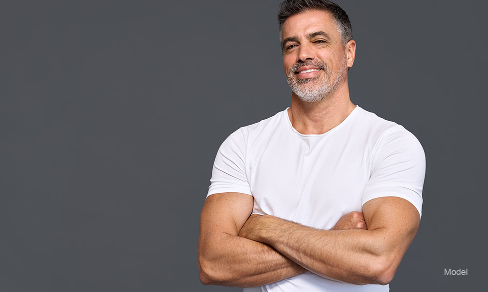 mature man wearing white shirt